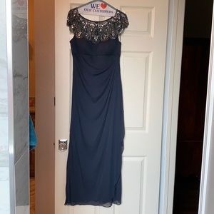 Xscape cap-sleeve illusion gown in charcoal gray